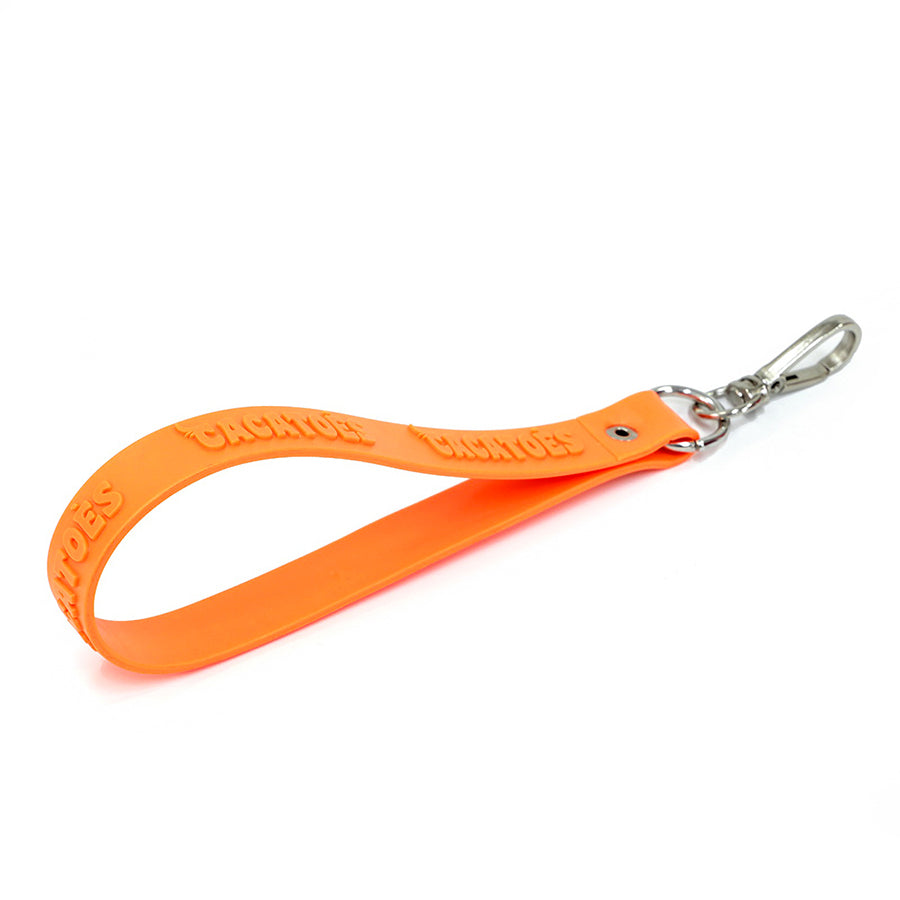 Porte-clés Cacatoès modèle Margo neon corail : un accessoire chic et intemporel en orange, parfait pour ajouter une touche de sophistication à vos clés.
