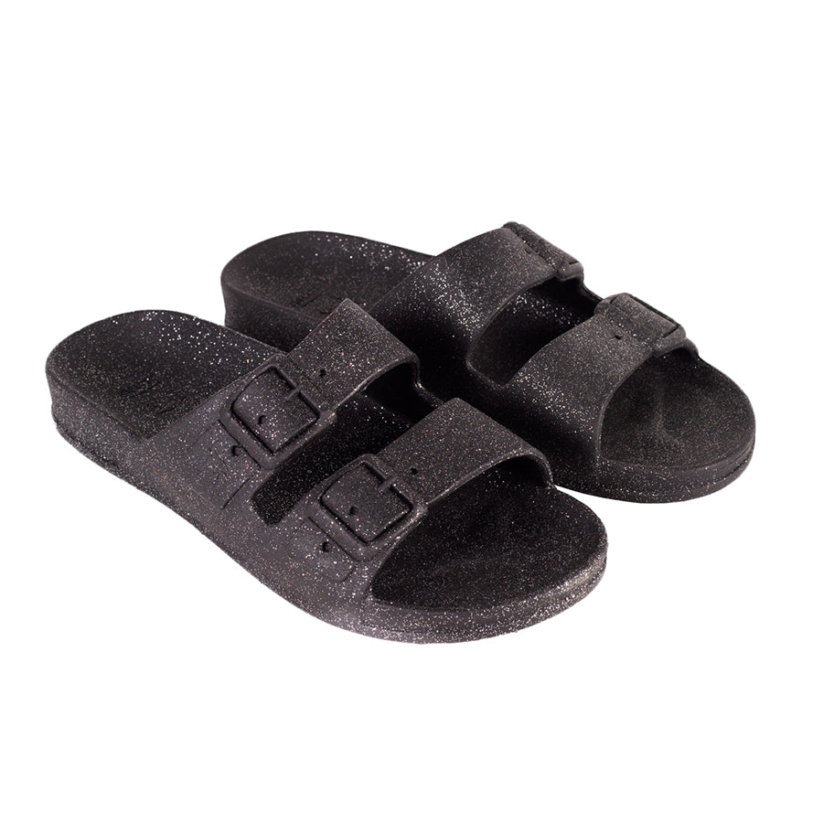 Sandales Cacatoès Carioca Black, vues en angle 3/4, élégantes et confortables, idéales pour une tenue décontractée et stylée.