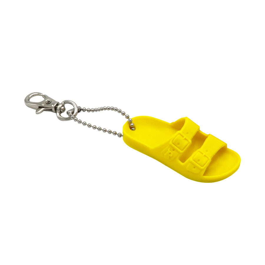 Porte-clés Cacatoès modèle Sinello jaune fluo : un accessoire pratique et élégant pour ajouter une touche de style à vos clés avec le design unique de la marque Cacatoès.