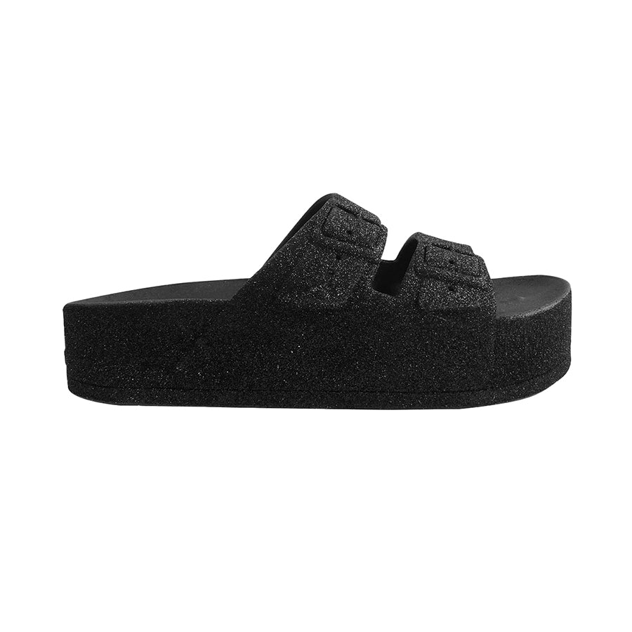 sandales Cacatoes Profil Caipirinha noires à paillettes : parfaites pour un look cool et stylé quand il fait beau. Elles sont confortables et ajoutent une touche d'éclat à tes journées